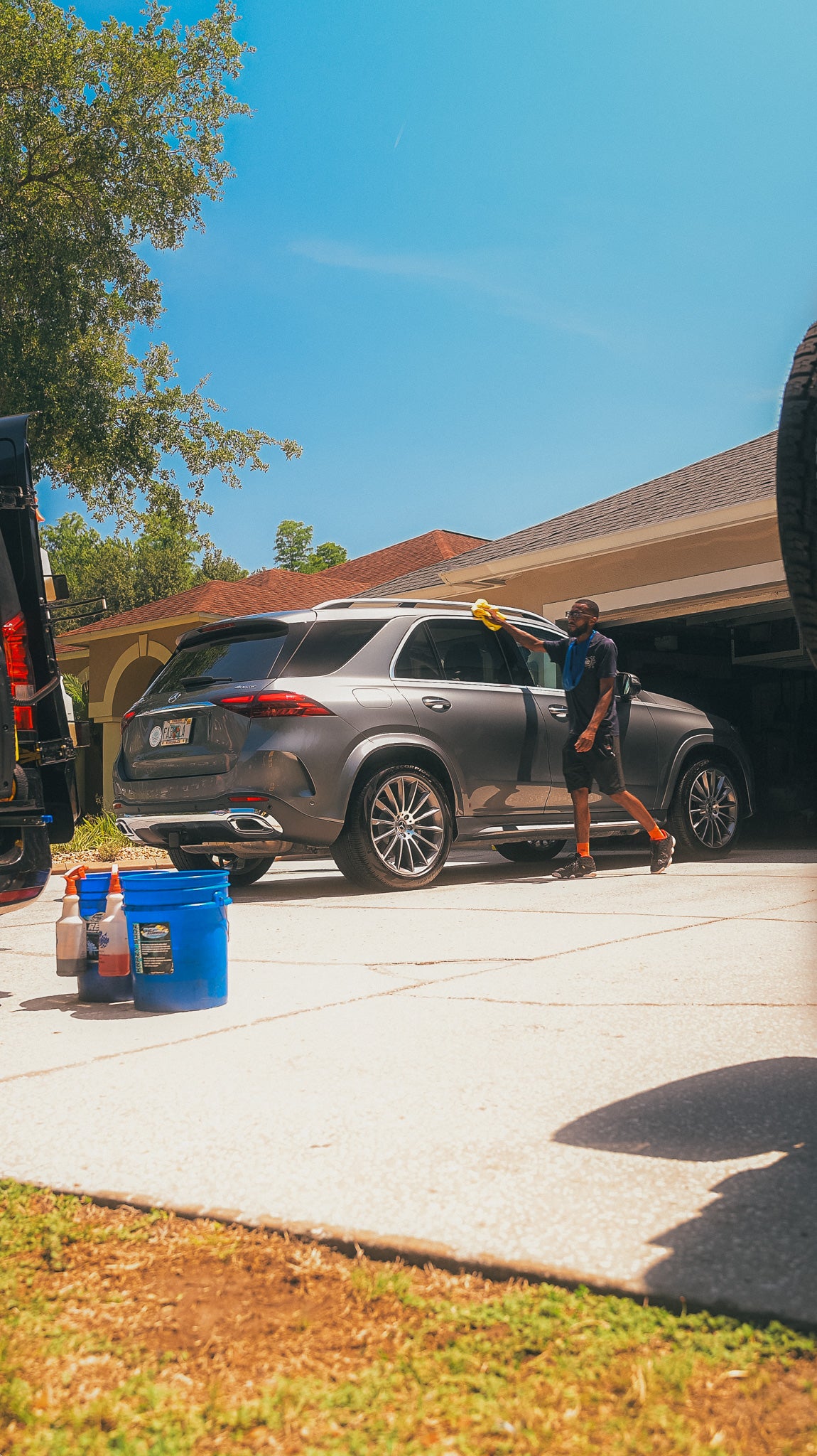 grey SUV receiving mobile detailing in Tampa, Florida.